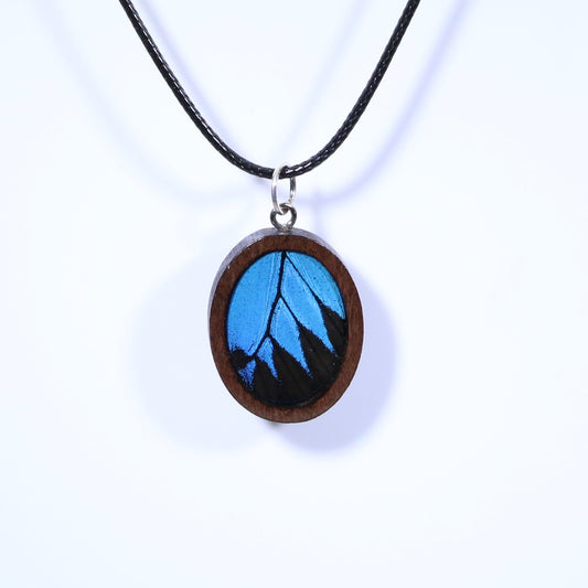 52617 - Real Butterfly Wing Jewelry - Pendant - Dark Wood - Oval - Plain - Blue Mountain Swallowtail