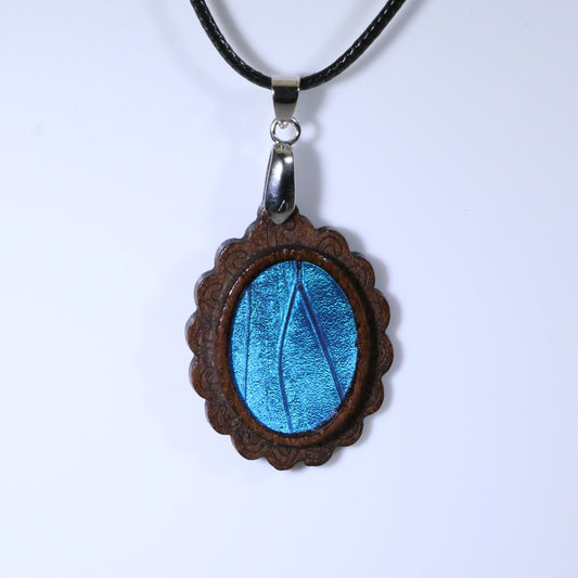 52711 - Real Butterfly Wing Jewelry - Pendant - Dark Wood - Oval - Filigree - Blue Morpho
