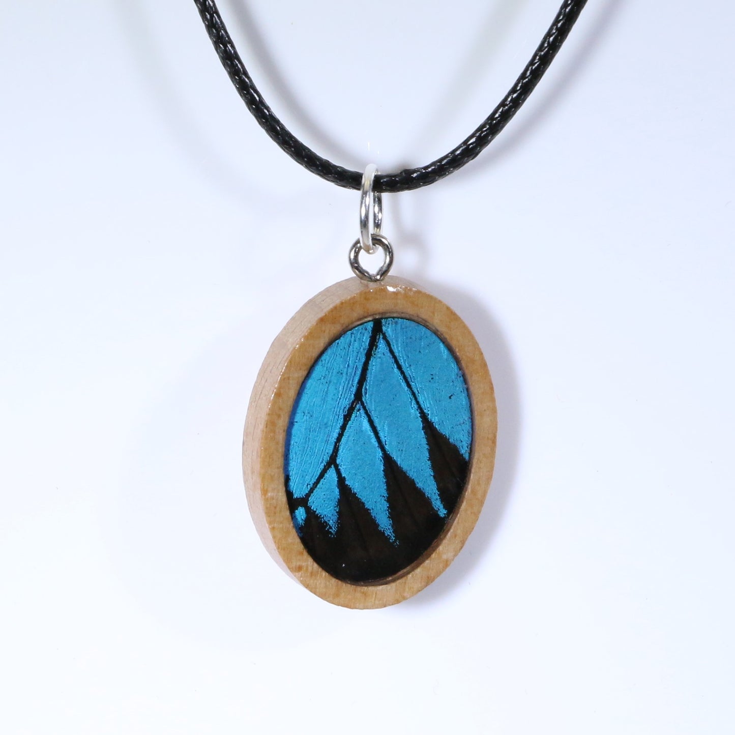 52607 - Real Butterfly Wing Jewelry - Pendant - Tan Wood - Oval - Blue Mountain Swallowtail