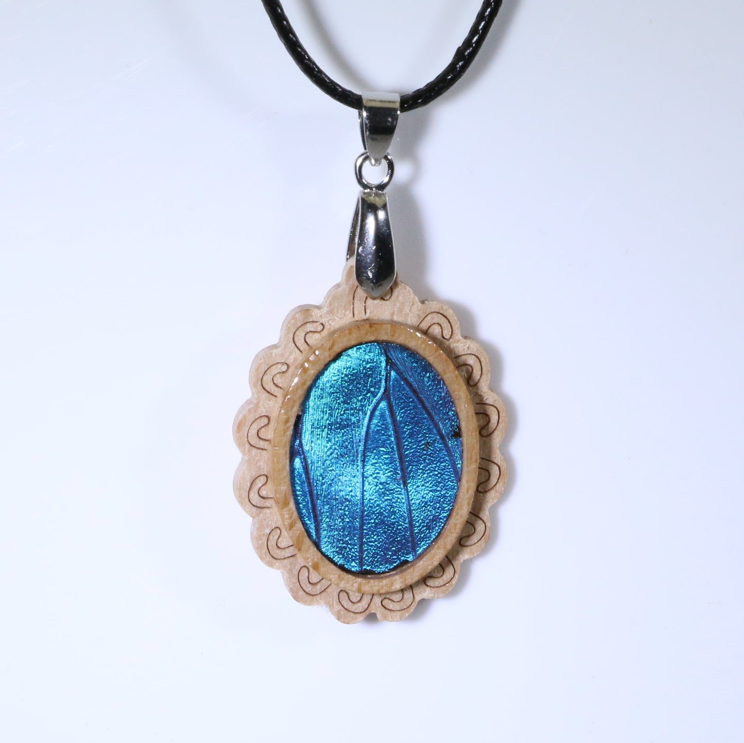 52701 - Real Butterfly Wing Jewelry - Pendant - Tan Wood - Oval - Filigree - Blue Morpho