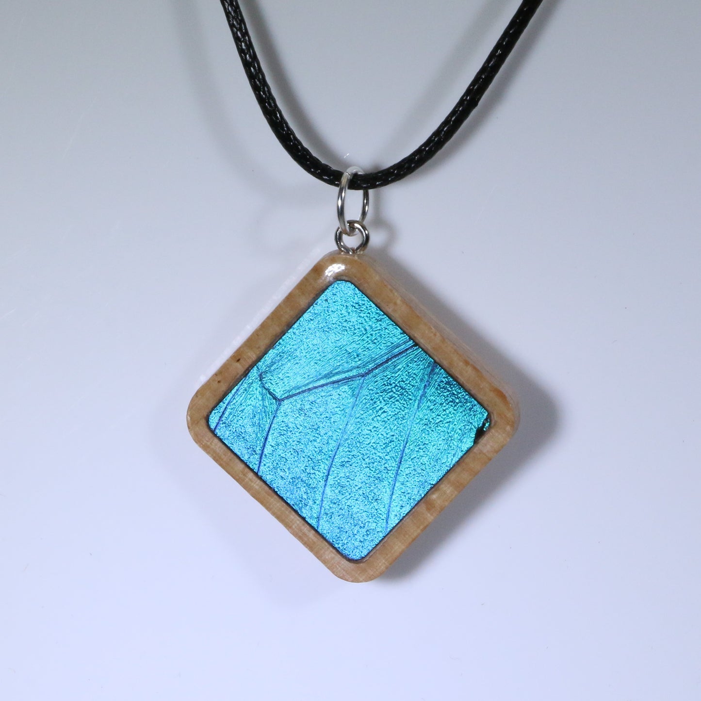 52901 - Real Butterfly Wing Jewelry - Pendant - Tan Wood - Large - Diamond Shape - Blue Morpho